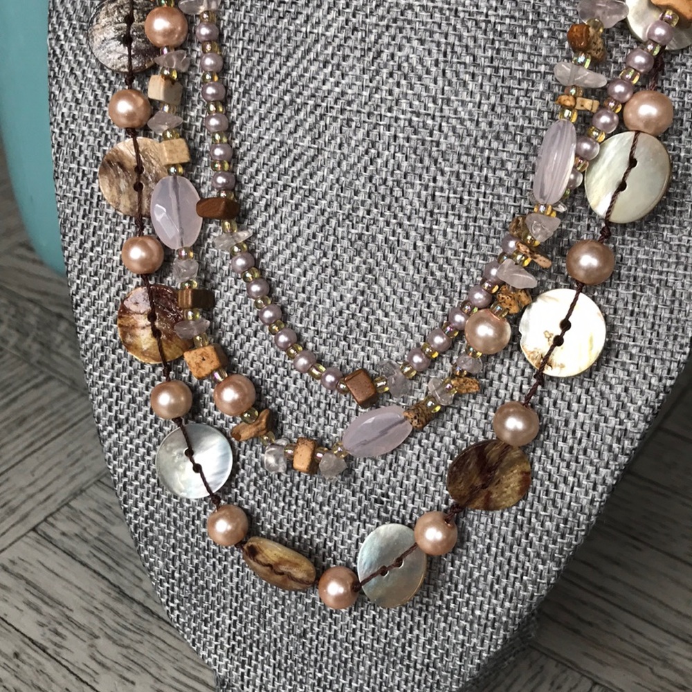 Beaded necklace.  Pinks, browns and earthy element